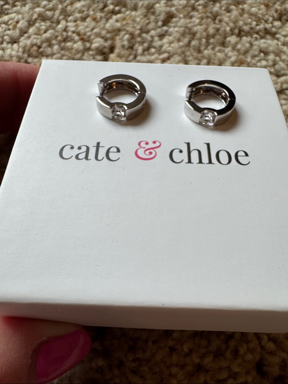 Cate & Chloe 18k white gold plated small hoop earrings with Swarovski crystals.